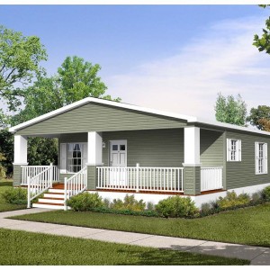 Photo of manufactured home green exterior with lawn and porch