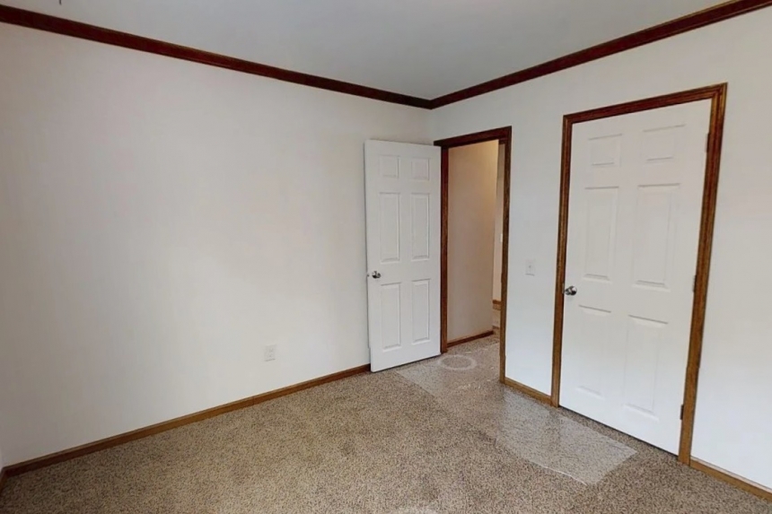 Modular home ranch 52J738-JM bedroom Photo Of Modular Home Ranch 52J738-Jm Unfurnished Bedroom With Open Door