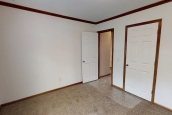 Modular home ranch 52J738-JM bedroom Photo Of Modular Home Ranch 52J738-Jm Unfurnished Bedroom With Open Door