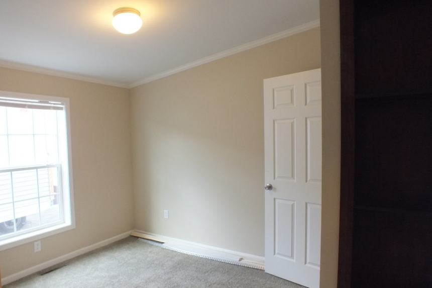 Double wide home 5225-508 bedroom and closet Photo Of Double Wide Home 5225-508 Unfinished Bedroom With Closet Door And Bright Window