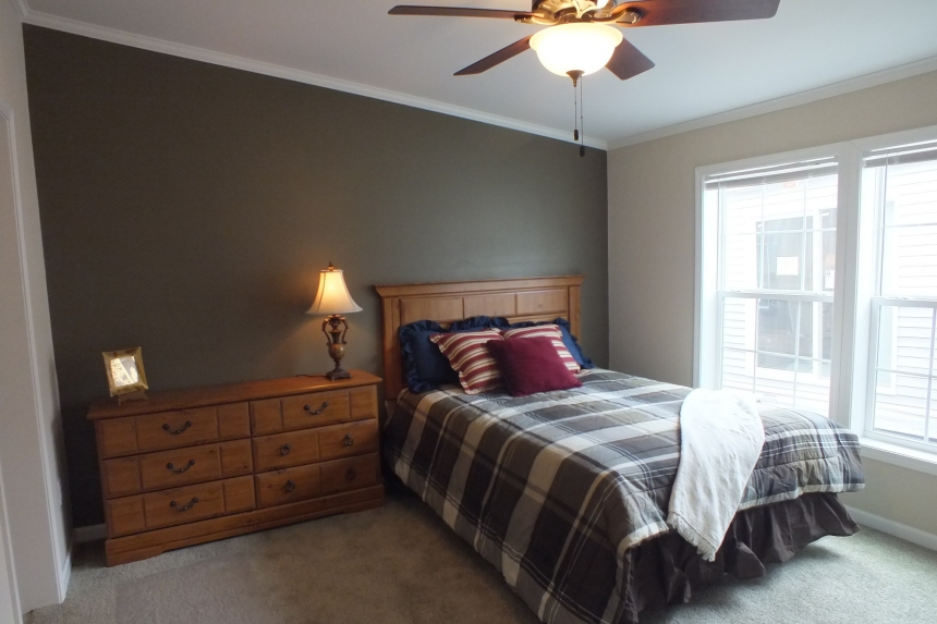 Double wide home 5225-508 bedroom and ceiling fan Photo Of Double Wide Home 5225-508 Furnished Bedroom With Large Windows And Ceiling Fan