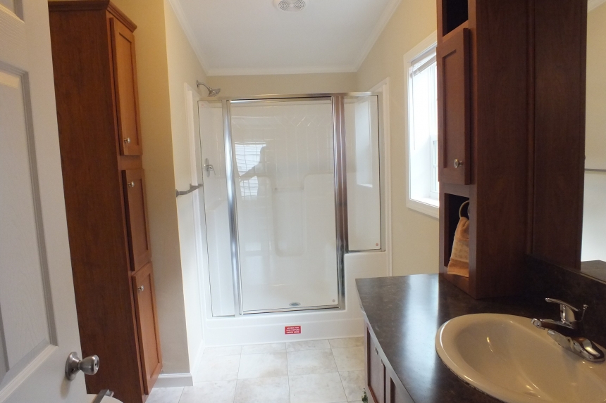 Double wide home 5225-508 bathroom Photo Of Double Wide Home 5225-508 Bathroom With Wood Cabinets And Shower