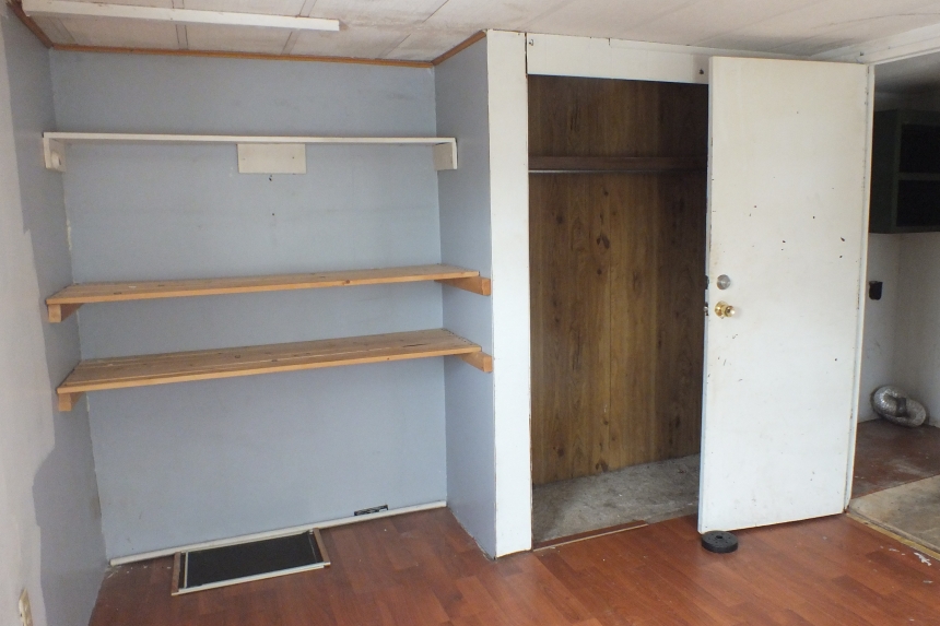 1979 Oxford single wide home bedroom closet Photo Of 979 Oxford Single Wide Home Unfurnished Bedroom With Large Closet And Door Opening To Hallway.