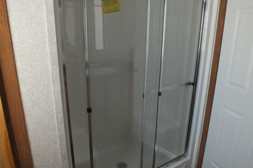 Single wide home in Milton Vermont shower A Photo Of 141 Milton Vermont Single Wide Home Bathroom Walk In Shower.