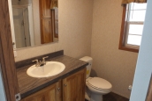 Single wide home in Milton Vermont bathroom sink and toilet A Photo Of 141 Milton Vermont Single Wide Home Bathroom Sink And Toilet.
