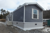 Single wide home in Milton Vermont exterior A Photo Of 141 Milton Vermont Single Wide Home Gray Exterior