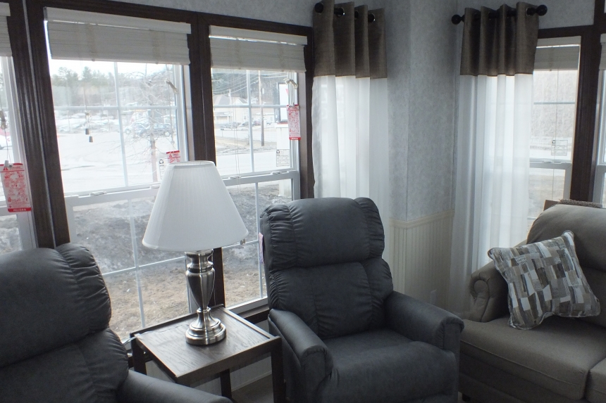 The Park Model 7 manufactured home living room A Photo Of Park Model 8 Manufactured Home Furnished Living Room With Sofa And Easy Chairs And Bright Windows.