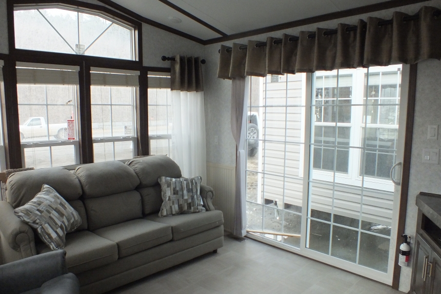The Park Model 7 manufactured home sliding doors A Photo Of Park Model 8 Manufactured Home Living Area With Couch And Large Sliding Glass Door.