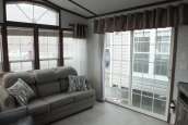 The Park Model 7 manufactured home sliding doors A Photo Of Park Model 8 Manufactured Home Living Area With Couch And Large Sliding Glass Door.
