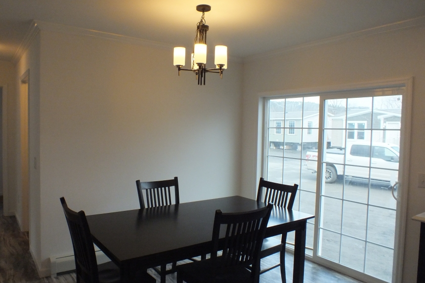 Stock Model 307 dining area A Photo Of The Stock Model 307 Manufactured Home Dining Area And Sliding Doors