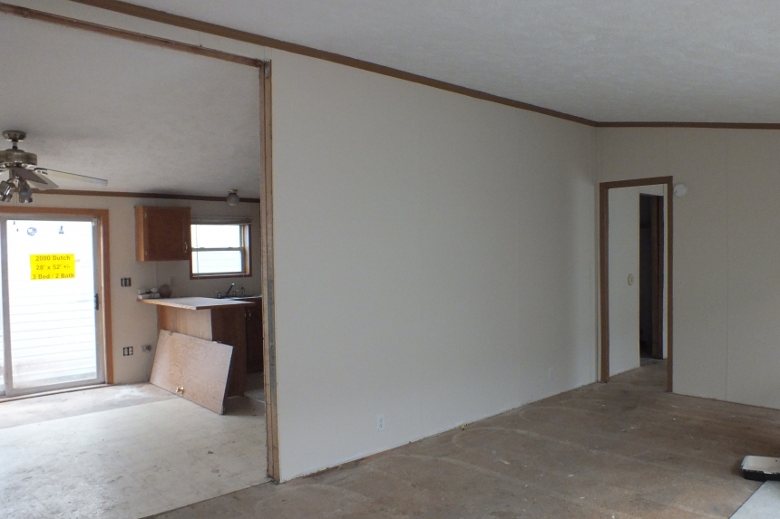 Double wide 2000 Dutch living area Photo Of Double Wide 2000 Dutch Unfurnished Living Area With White Walls