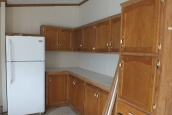 Double wide 2000 Dutch kitchen Photo Of Double Wide Home 2000 Dutch Kitchen With White Refrigerator And Wood Cabinets