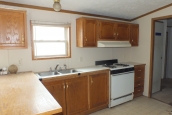 Double wide 2000 Dutch kitchen stove Photo Of Double Wide Home 2000 Dutch Kitchen With Sink Stove And Bright Window