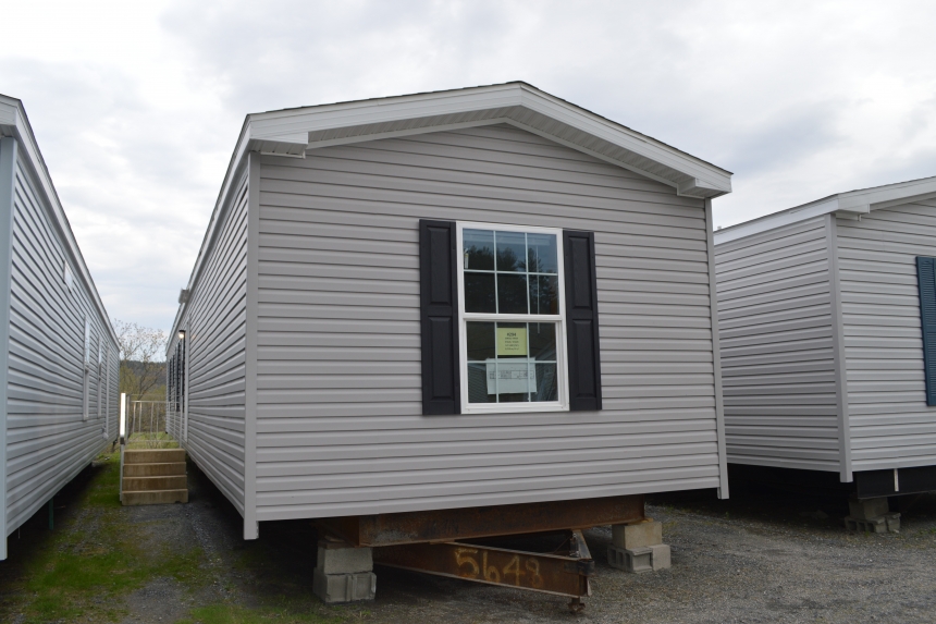 294 stock model single wide home exterior A Photo Of Stock Model 294 Single Wide Home Gray Exterior