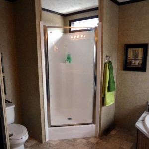 Photo of manufactured home bathroom small walk in shower.