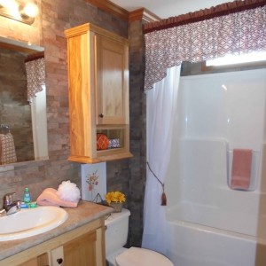 Photo of manufactured home bathroom toilet and shower tub combo