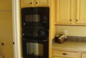 Double Wide home 5228-405-1 oven Photo Of Double Wide Home 5228-405-1 Black Oven And Wood Cabinets
