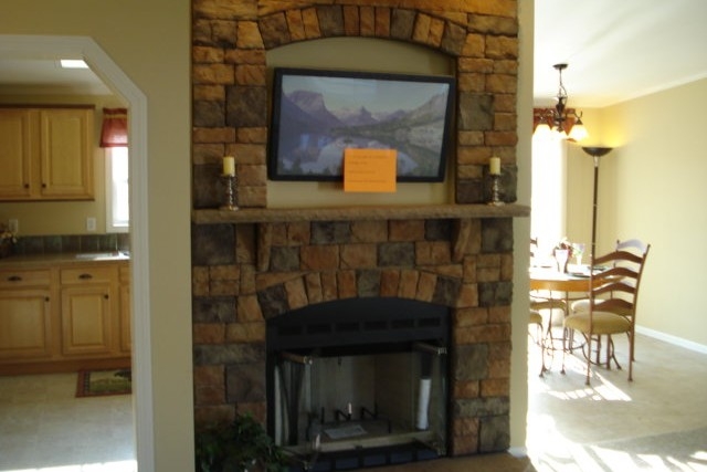 Double Wide home 5228-405-1 fireplace Photo Of Double Wide Home 5228-405-1 Fireplace With View Into Bright Dining Area And Kitchen