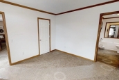Modular home ranch 52J738-JM bedroom with doors Photo Of Modular Home Ranch 52J738-Jm Room With Access To Living Area And Bathroom
