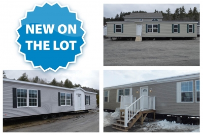 New display models A photo of a new single-wide home and two new double-wide homes on the Fecteau Homes lot.