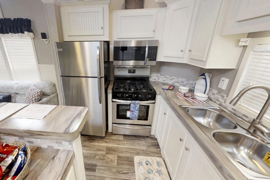 Park Model 40FKL kitchen A Photo Of Park Model 40Flk Kitchen With White Cabinets And Appliances