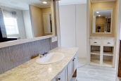 Single wide home 8016-721 bathroom and vanity Photo Of Single Wide Home 8016-721 Bathroom With Vanity And White Cabinets