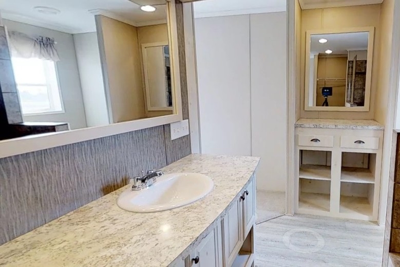 Single wide home 8016-721 bathroom and vanity Photo Of Single Wide Home 8016-721 Bathroom With Vanity And White Cabinets