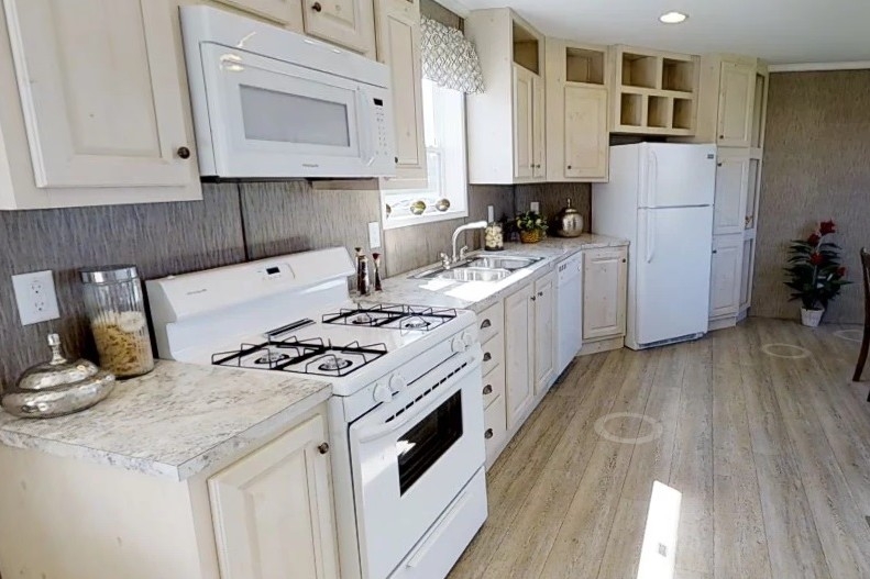Single wide home 8016-721 kitchen Photo Of Single Wide Home 8016-721 Kitchen With Appliances And Wood Cabinets