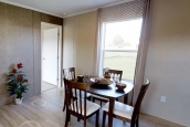 Single wide home 8016-721 dining area Photo Of Single Wide Home 8016-721 Dining Area With Small Table And Bright Window